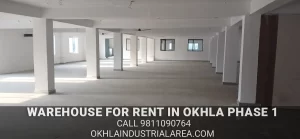 Clean and empty interior of a commercial godown on lease in Okhla Phase 1.