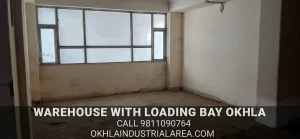 Industrial shed with secure loading bay in Okhla Estate.