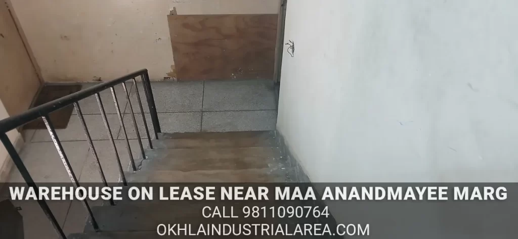 Main road facing warehouse space on lease near Maa Anandmayee Marg.